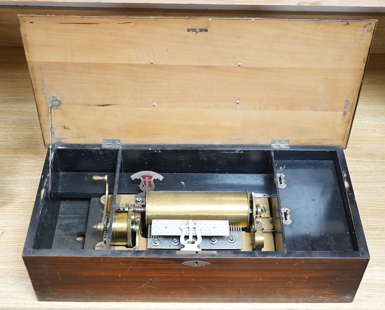 A 19th century Swiss cylinder music box, 58cm wide. Condition - fair to good, considerable wear to case